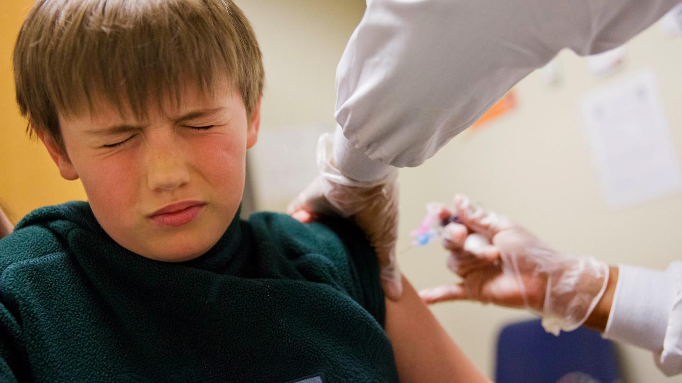kid getting flu shot